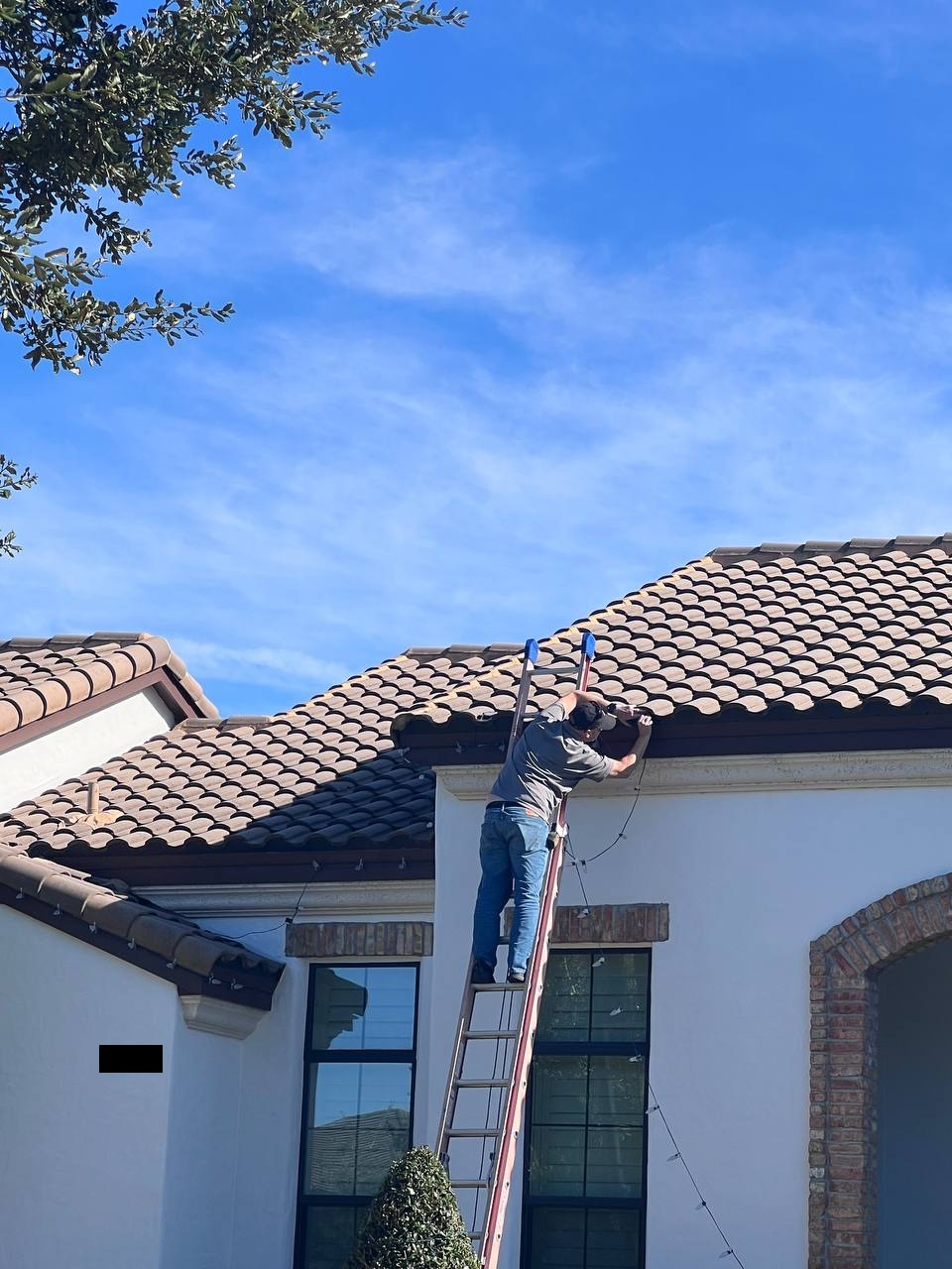 Holiday lighting along roofline