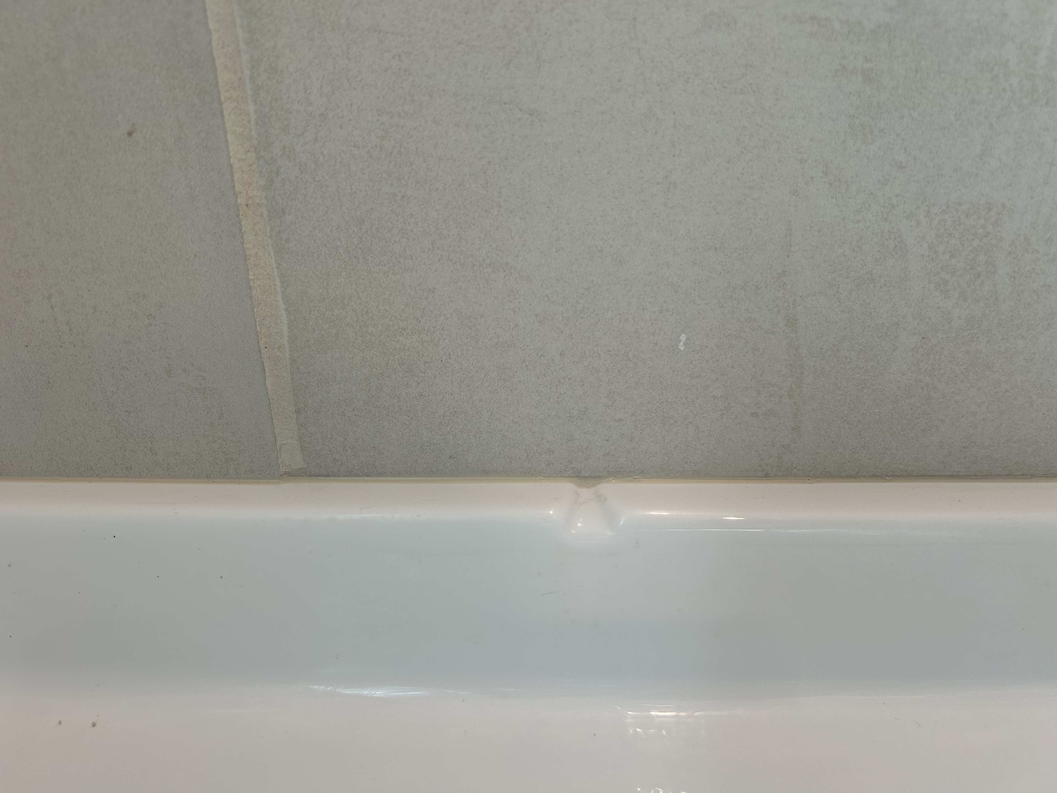 Caulking around shower pan