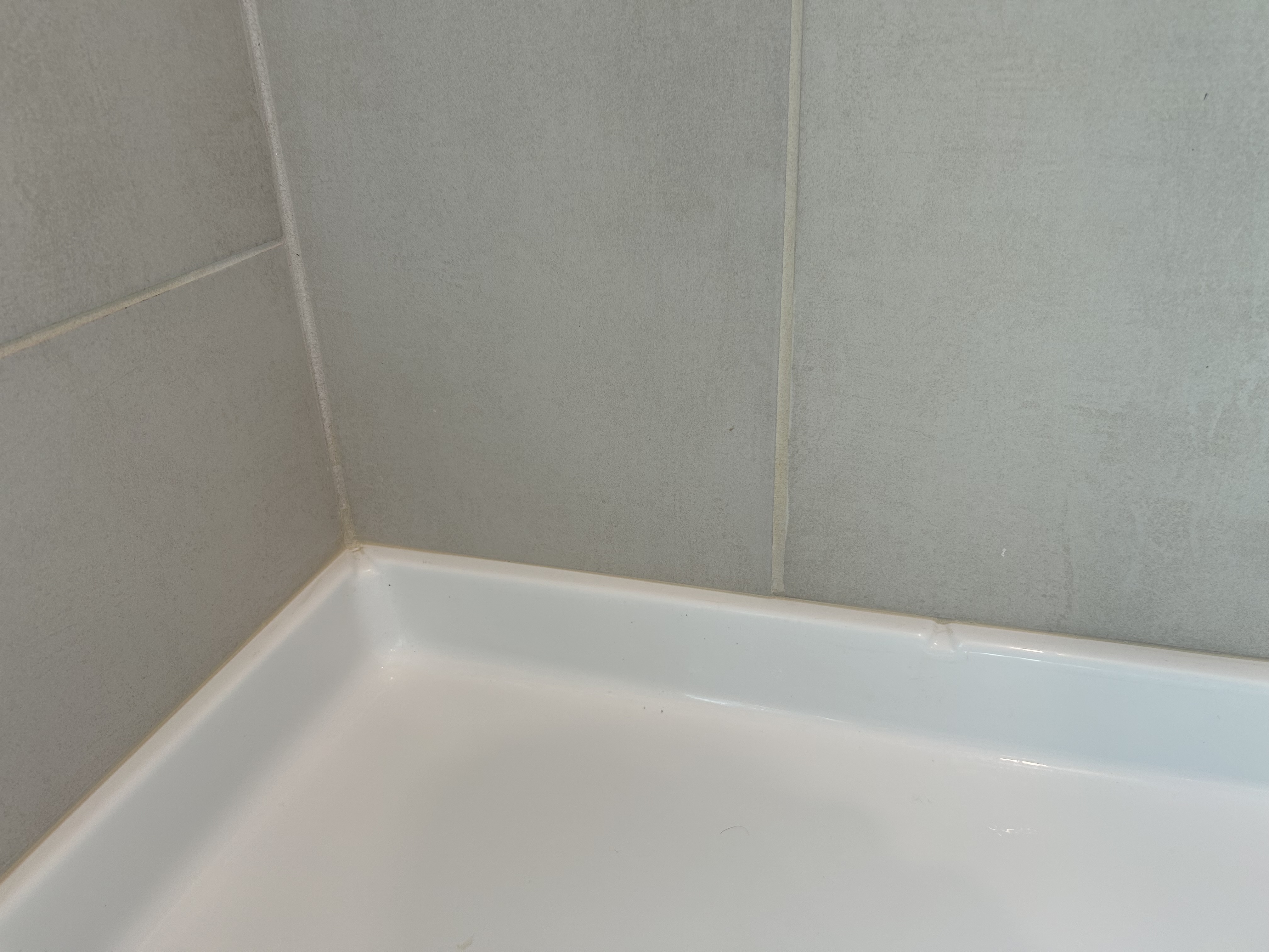 Caulking around shower pan