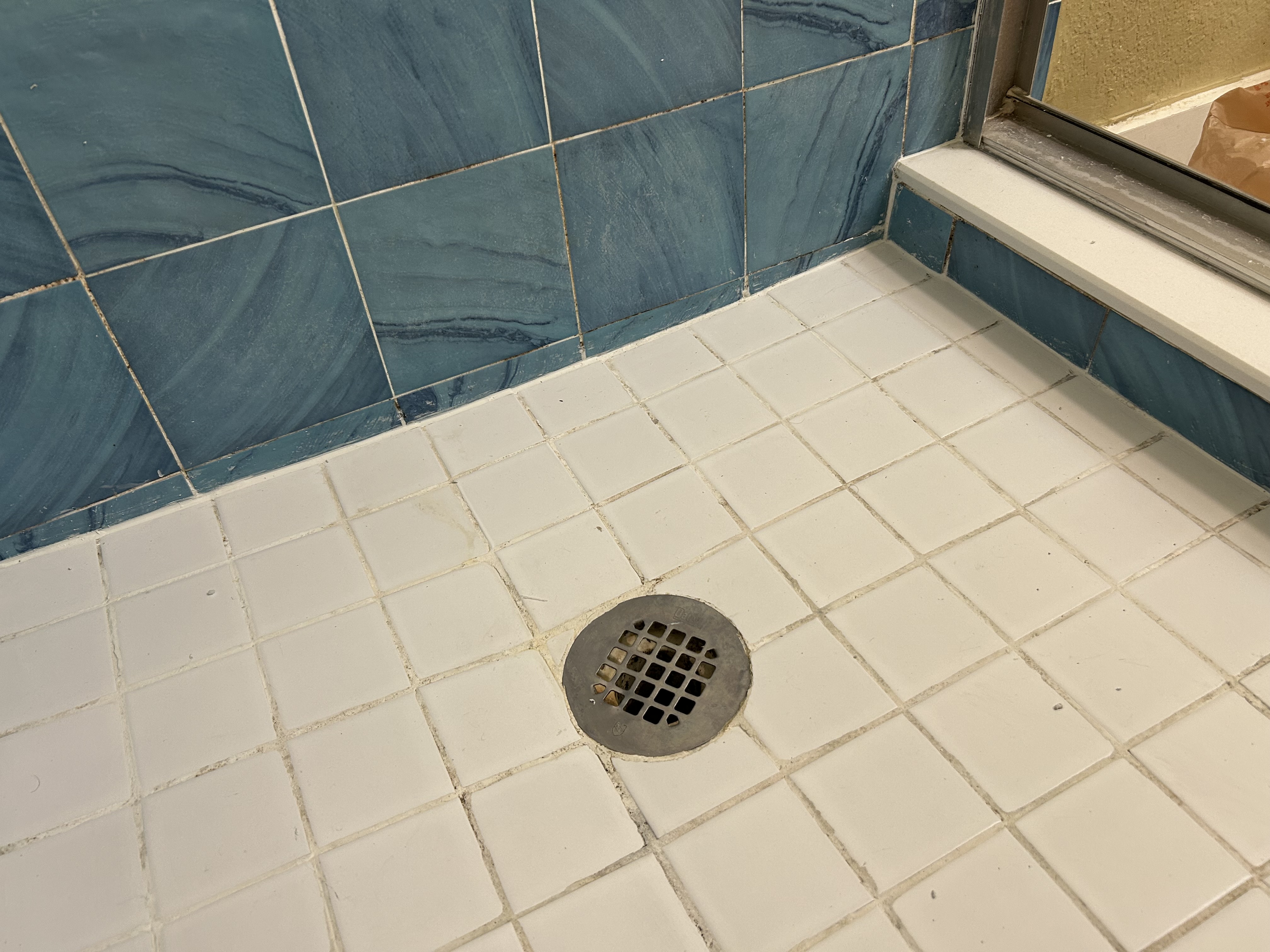 Caulking around shower pan