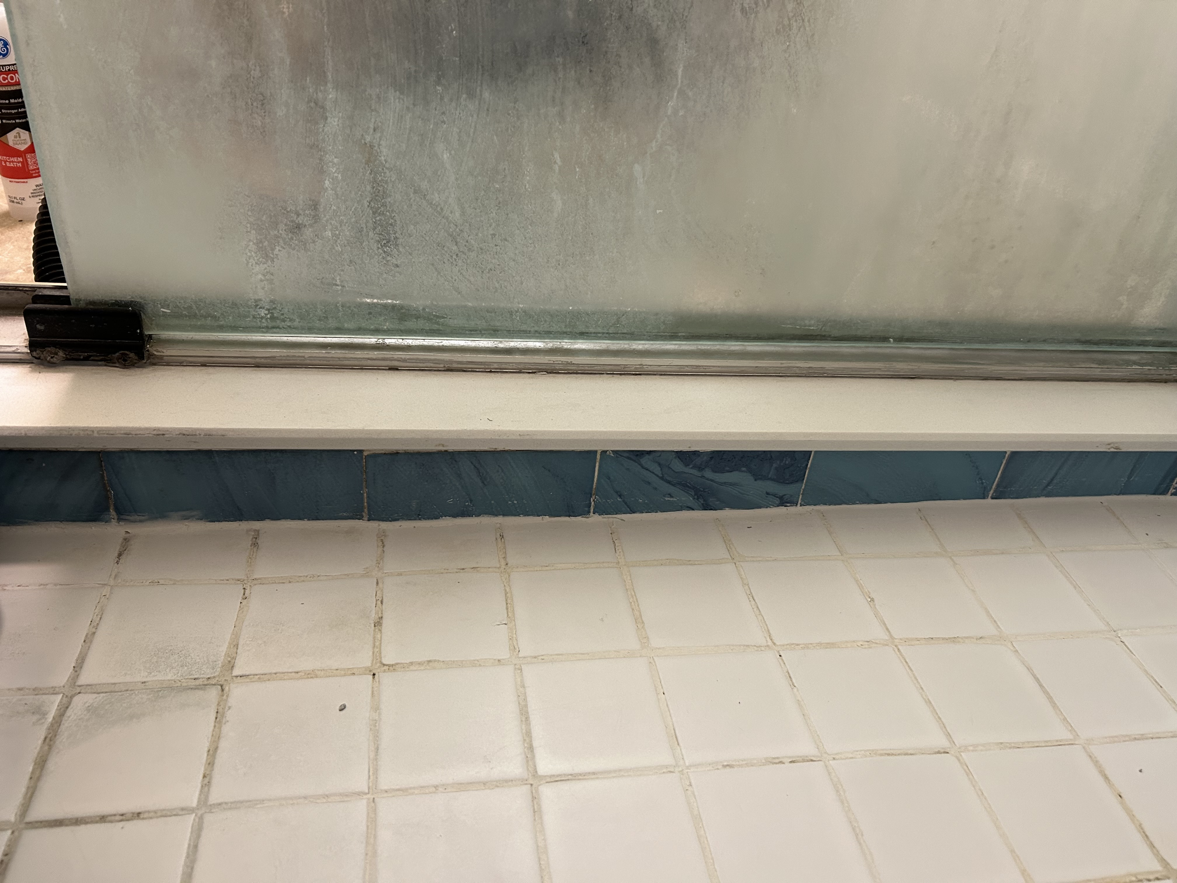 Caulking around shower pan