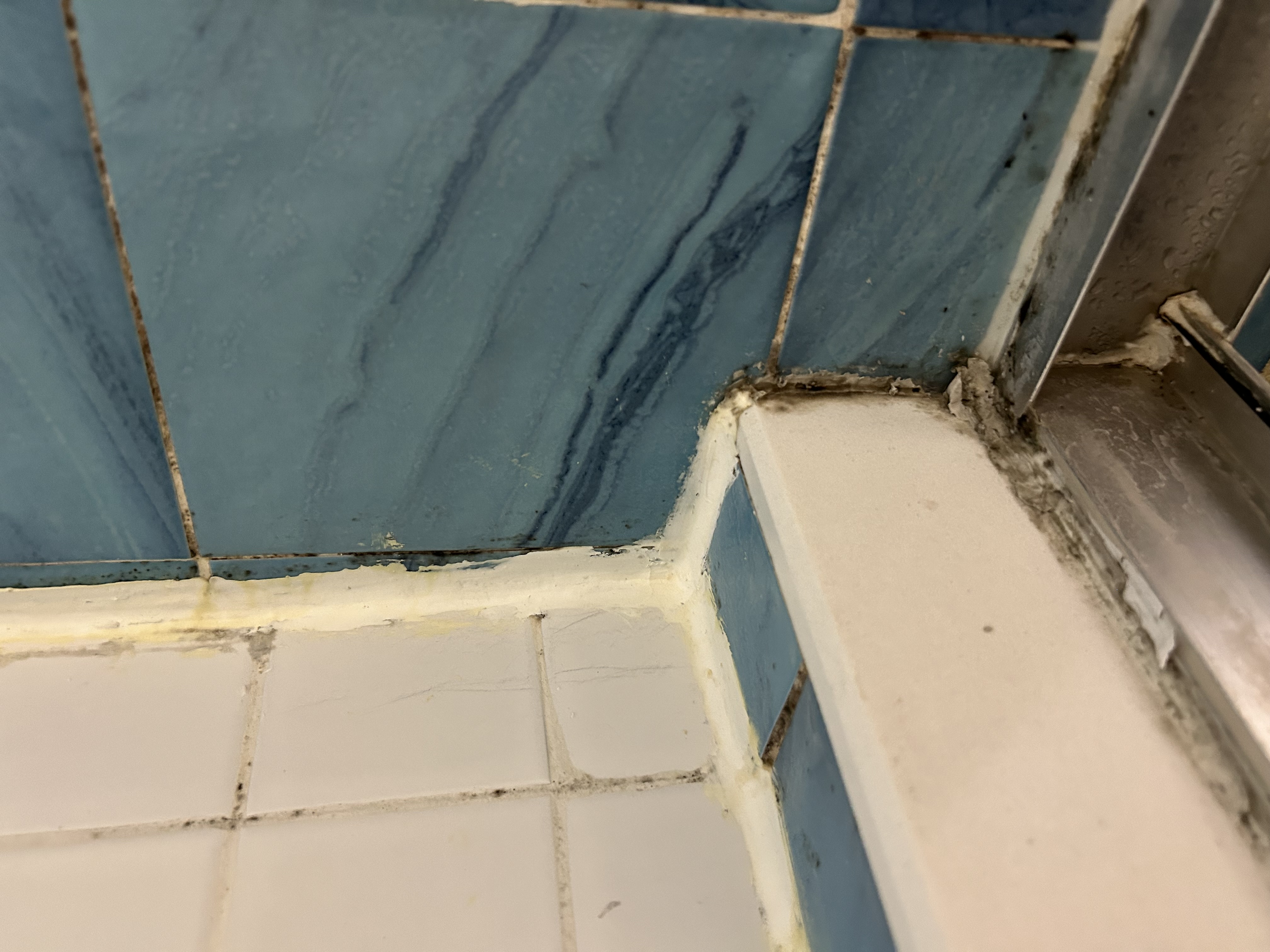 Caulking around shower pan